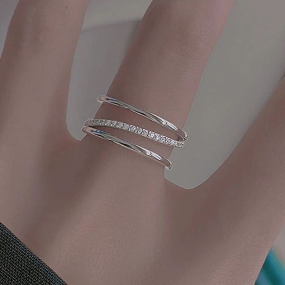 - The Triple Bling Ring adjustable in  925 silver & cubic zirconia